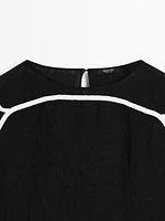 Blouse with contrast embroidery