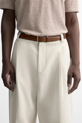 CEINTURE EN CUIR SURPIQUÉE