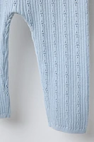 PANTALON EN MAILLE AJOURÉ