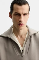 TECHNICAL QUARTER-ZIP SWEATSHIRT