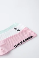 THREE-PACK OF TEXT PRINT LONG SOCKS