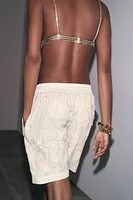 SOUTIEN-GORGE TRIANGLE RELIEF FANTAISIE