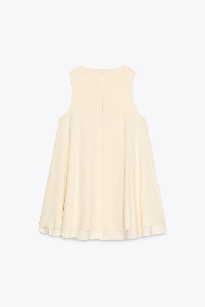 ROBE COURTE VOLUME