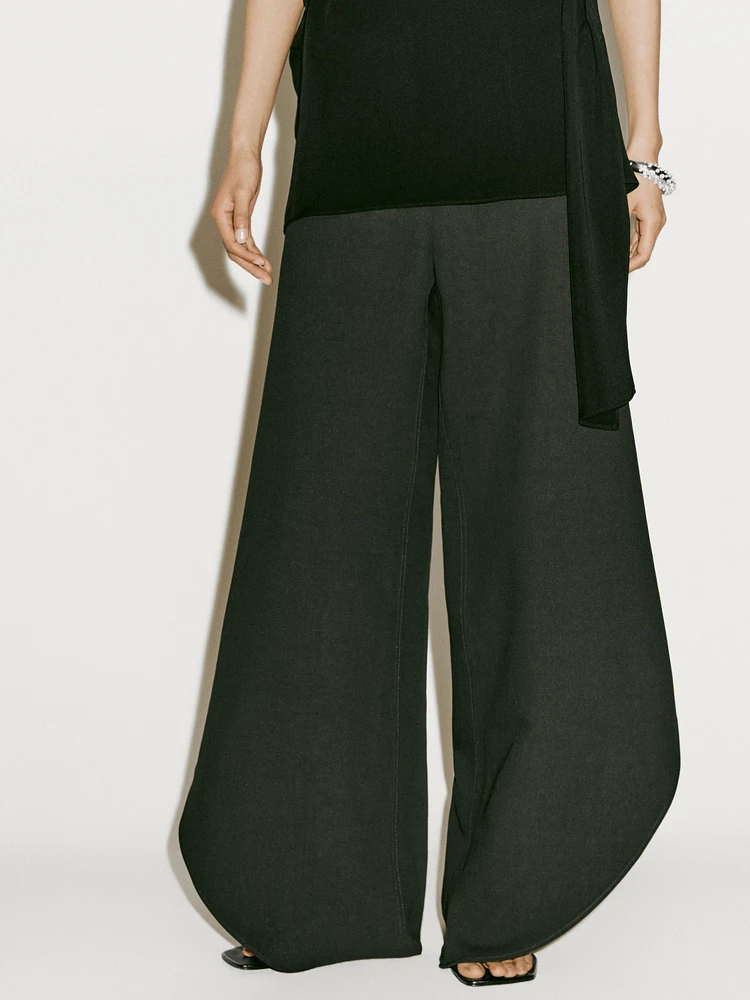 Trousers with split hems - Limited Edition