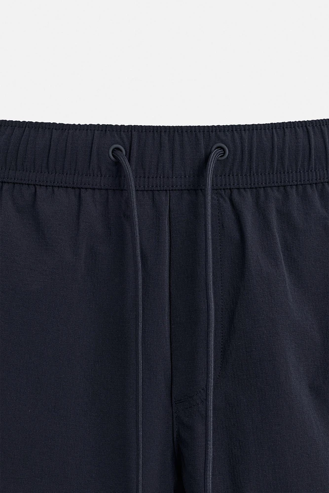 CONTRAST BANDS MID-LENGTH SWIMSUIT