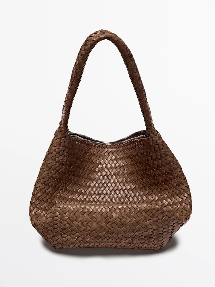 Sac seau tressé en cuir nappa