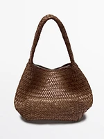 Sac seau tressé en cuir nappa