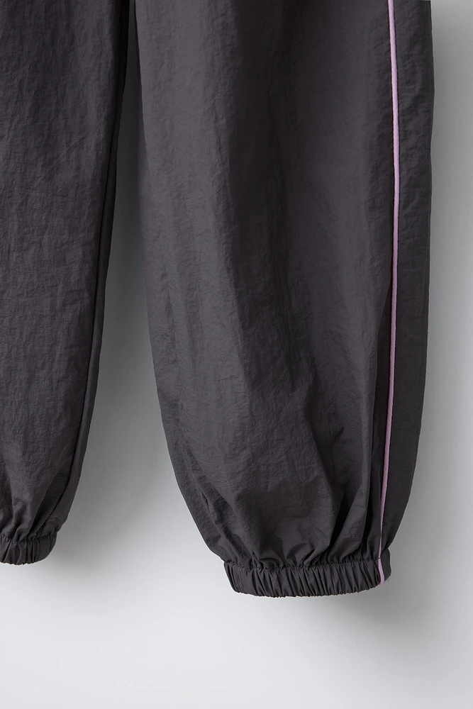 TECHNICAL BOW JOGGER PANTS