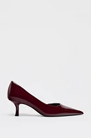 ASYMMETRIC HEELED SHOES