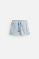 MAILLOT DE BAIN SEMI-LONG À IMPRIMÉ GÉOMÉTRIQUE