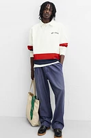 POLO À BANDES EN CONTRASTE