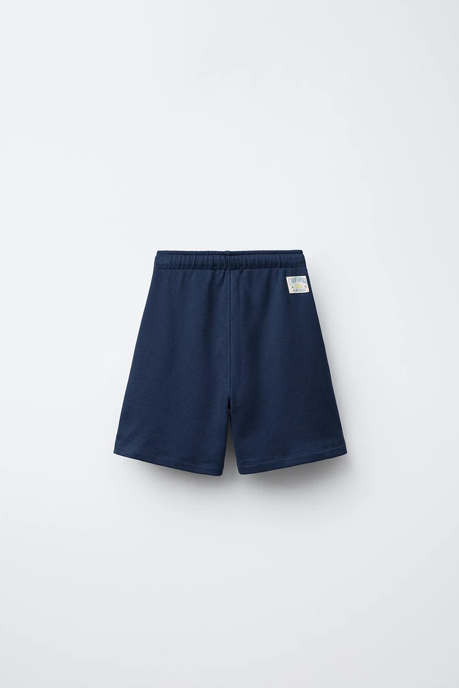 SURF PRINT PLUSH SHORTS