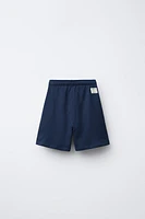 SURF PRINT PLUSH SHORTS