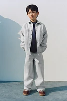 JEAN DENIM LARGE À REVERS