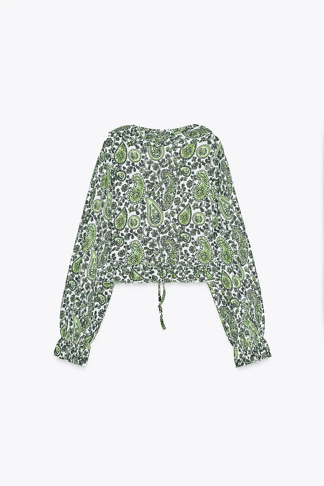 RUFFLED V-NECK TOP