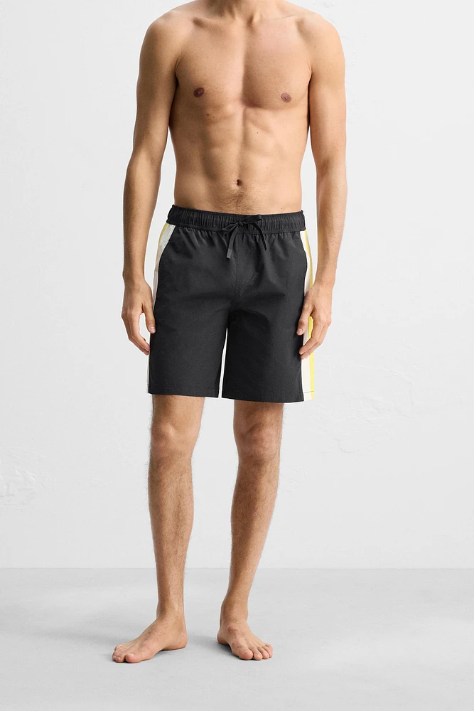 STRIPED LONG SWIM TRUNKS