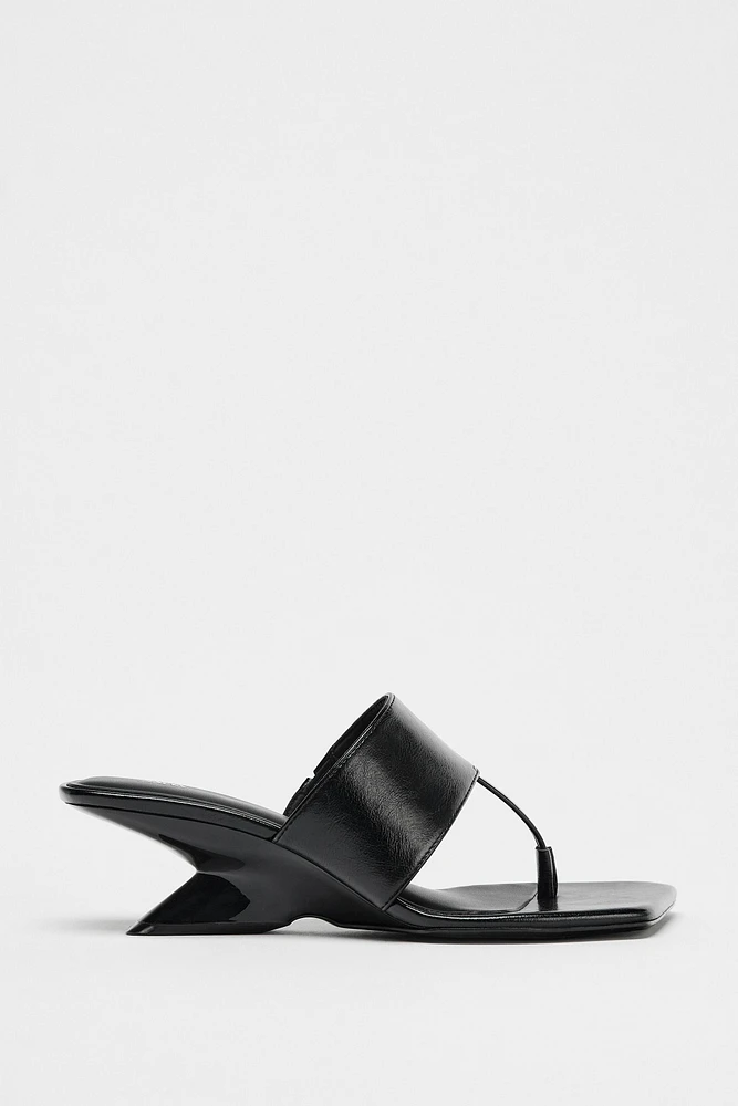 ASYMMETRIC WEDGE HEELS