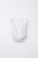 TEXTURED FLORAL BODYSUIT