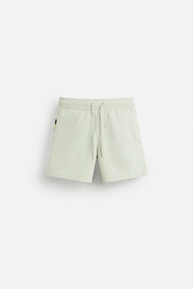 CONTRAST BANDS MID-LENGTH SWIMSUIT