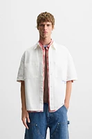 CHEMISE BRODÉE EN MATIÈRES VARIÉES
