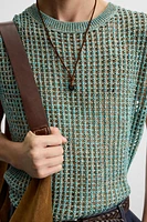 GILET SANS MANCHES EN MAILLE AJOURÉE