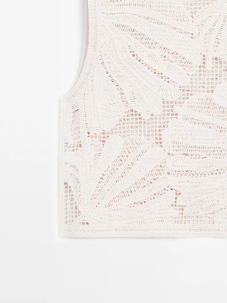 Openwork crochet top with floral detail