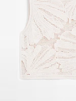 Openwork crochet top with floral detail