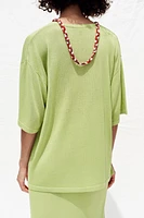 TOP OVERSIZE EN MAILLE MANCHES COURTES