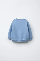 QUILTED CAR SWEATSHIRT