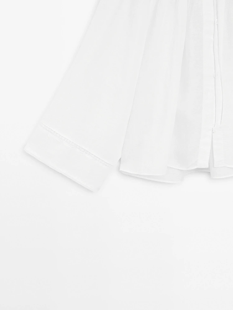 Flowing blouse with lace detail