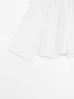 Flowing blouse with lace detail