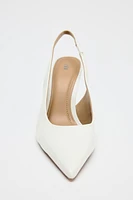 CHAUSSURES À TALONS ASYMÉTRIQUES