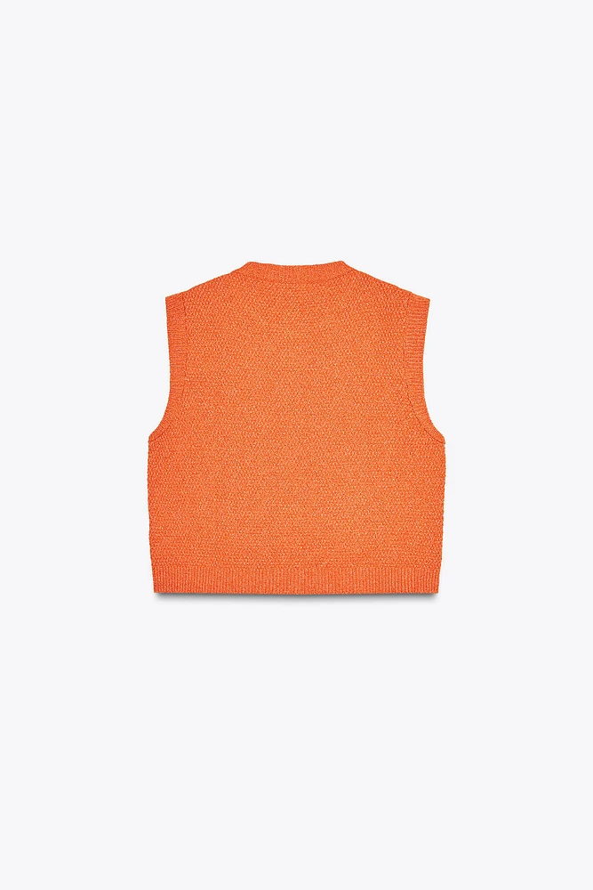 TOP GILET EN MAILLE BOUTON COQUILLAGE