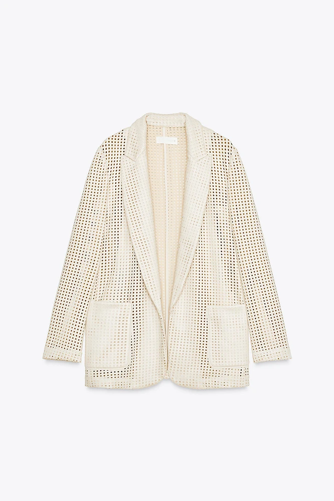 VESTE DÉCOUPÉE EFFET DAIM