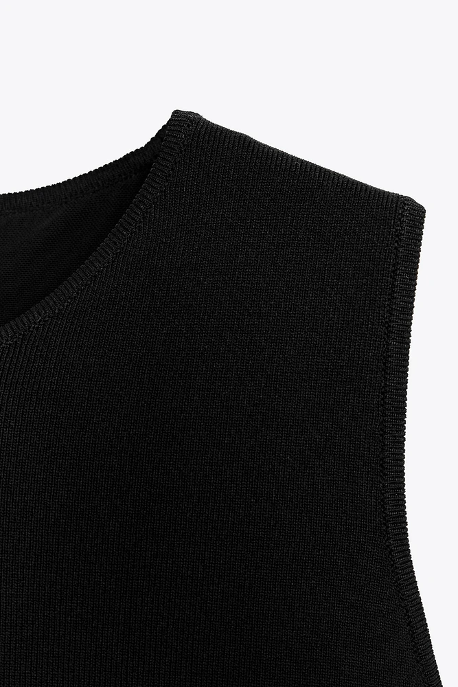 PUFFY HEM KNIT TOP