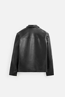 BLOUSON EN CUIR SYNTHÉTIQUE À POCHES