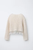 PULL EN MAILLE RÉSILLE À FRANGES