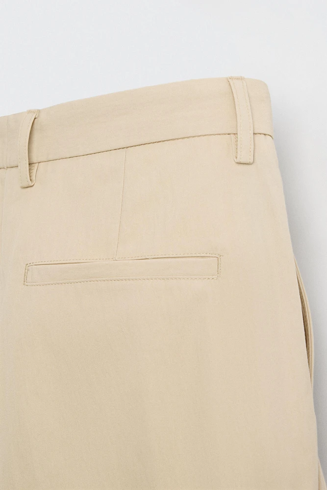 LIMITED EDITION RELAXED FIT PLEATED PANTS