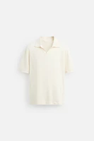 POLO À MAILLES AJOURÉES
