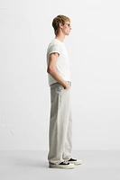 ASYMMETRIC SEAM BAGGY FIT JEANS