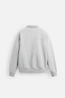 BASIC QUARTER ZIP SWEATSHIRT