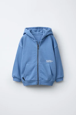 VESTE ZIPPÉE AVEC INSCRIPTION