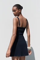 ROBE Z1975 MINI EN DENIM À BRETELLES