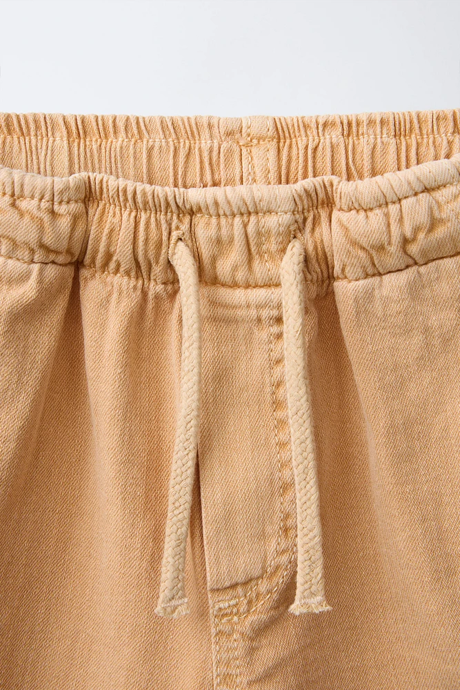 SHORT À TAILLE PLISSÉE
