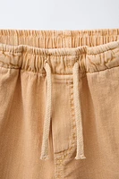 SHORT À TAILLE PLISSÉE