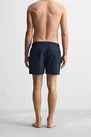 STRUCTURED REGULAR SWIM SHORTS