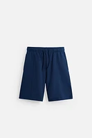 BERMUDA DE JOGGING COUTURES