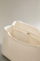 QUILTED EMBROIDERED TOILETRY BAG