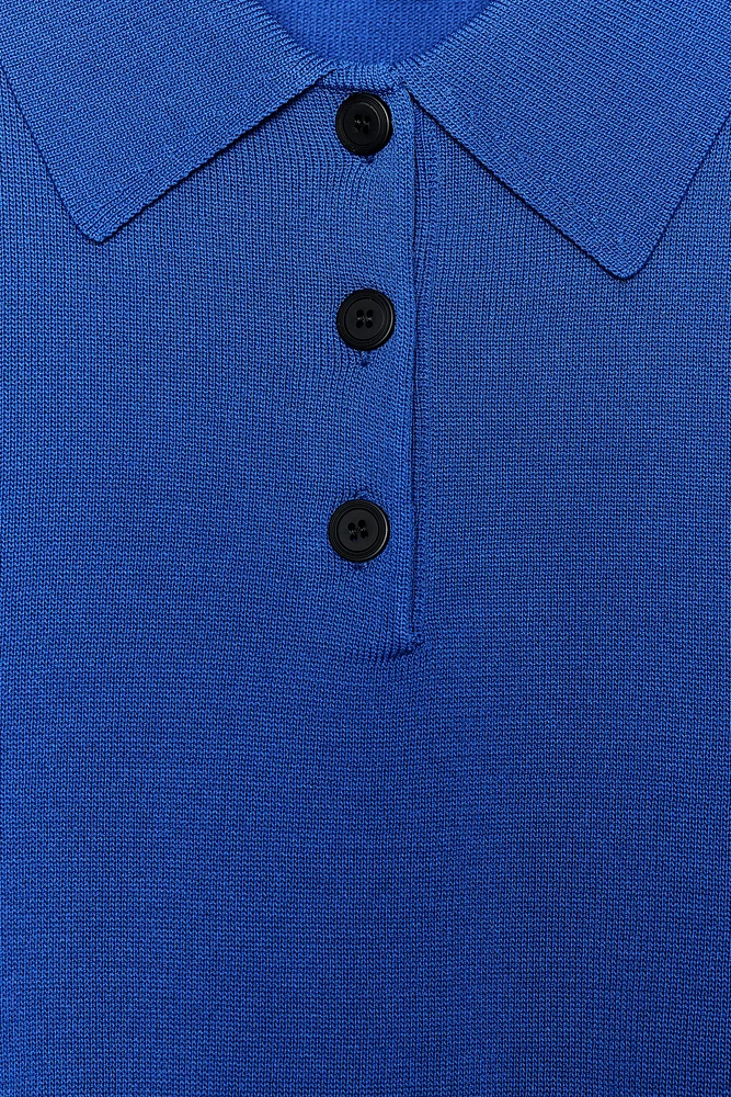 TOP POLO EN MAILLE À MANCHES COURTES