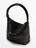 Sac seau tressé en cuir nappa